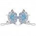 9.71 ct Oval Shaped Turquoise, Tanzanite and Black Diamond Earrings in 14 kt White Gold